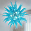 Azure Starburst blown glass chandelier featuring a dense arrangement of hand-blown ice-blue tapered glass elements.