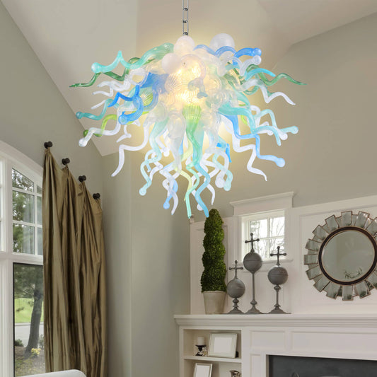 Colorful chandelier in Chihuly type hanging in a room with decor elements.