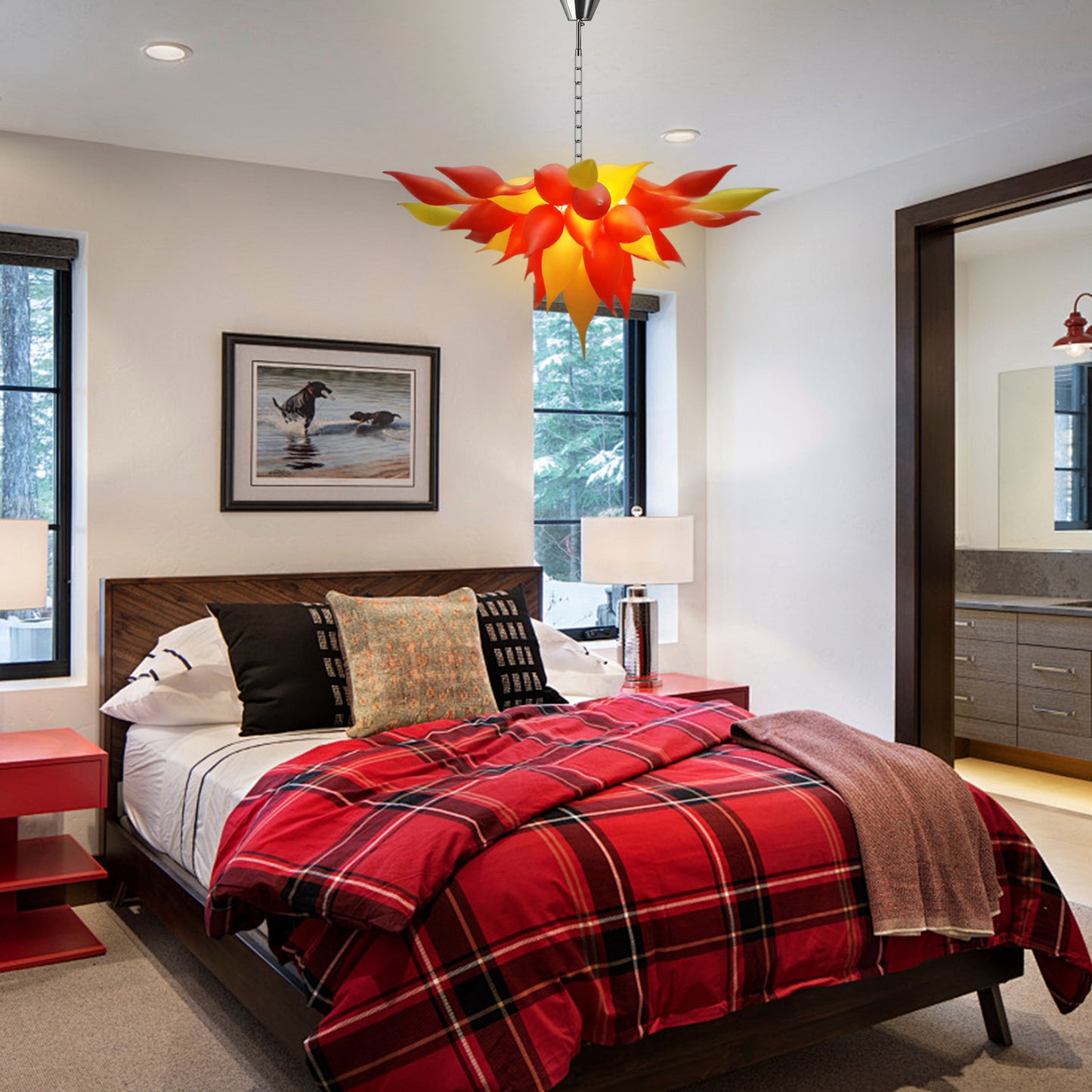 Red and orange petal modern blown glass chandelier in cozy bedroom.