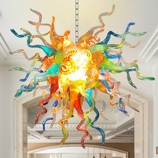 Chihuly Style Colorful glass chandelier hanging in a room with white ceiling and walls.