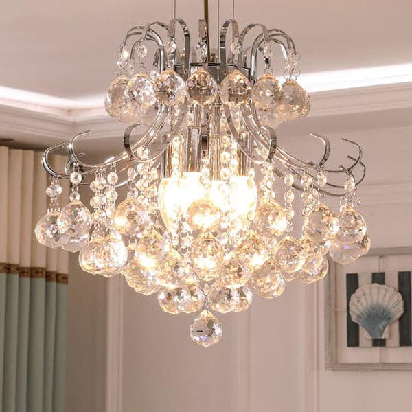 Close-up of high-quality sparkling crystal balls on a contemporary ceiling light fixture.