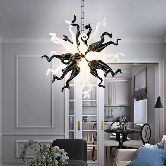 Modern style Black & White Burst chandelier, blending black and white blown glass for a dramatic statement piece.