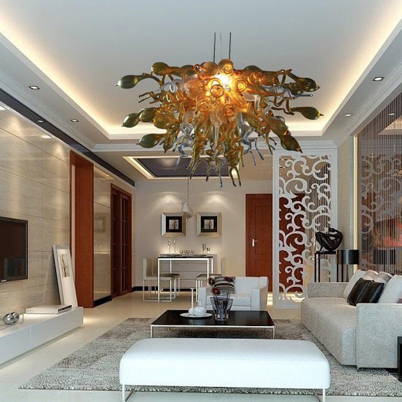 Luxury modern living room with grand architecture featuring the golden and clear glass chandelier as a sophisticated artistic focal point.