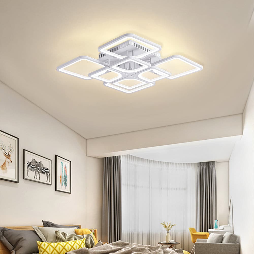 Geometric square LED ceiling light in a warm modern living room setting.