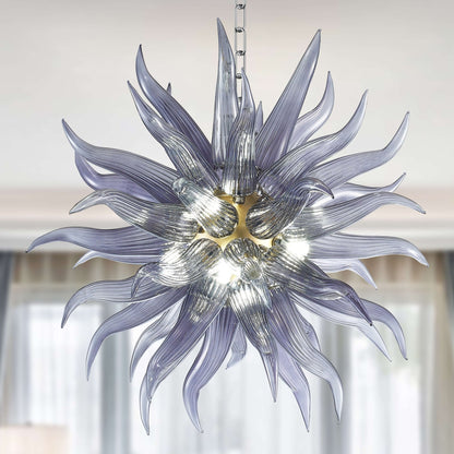 Celestial Mist starburst chandelier featuring smoke grey hand-blown glass petals and a polished gold central fixture.