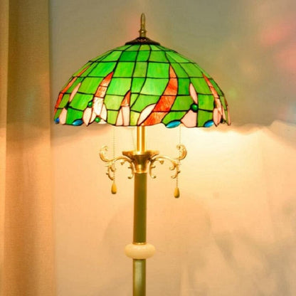 Handmade stained glass lampshade detailing in green and red