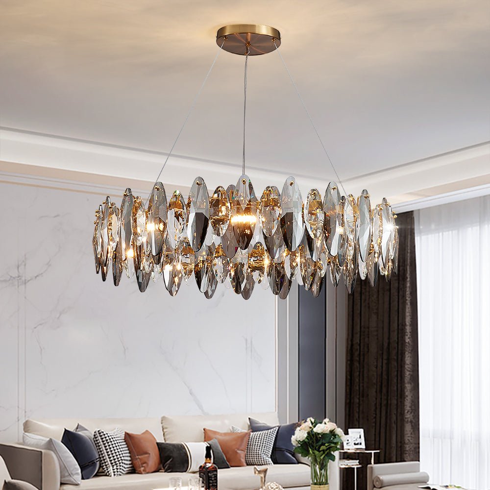 Contemporary round crystal pendant light for elegant home decor and high-end interiors.