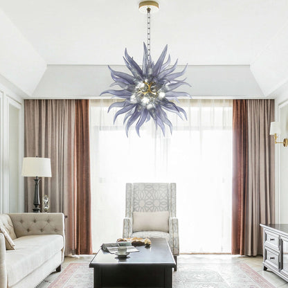 Luxury smoky glass chandelier illuminating a bright, high-ceiling entryway with elegant floor-to-ceiling curtains.