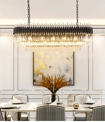 Artistic linear crystal lighting fixture for modern dining room or kitchen island decor.
