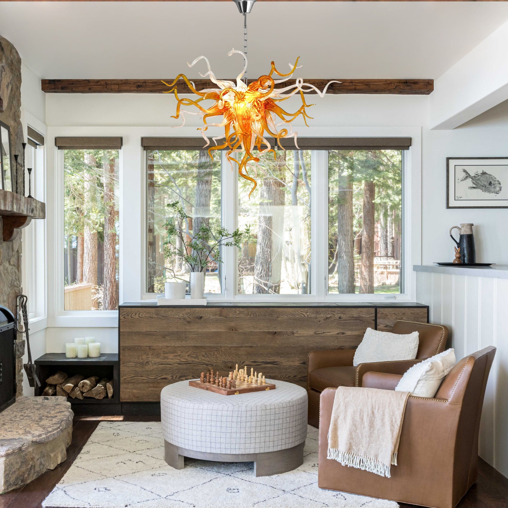 Chihuly-inspired amber hand blown glass chandelier in cozy living room.