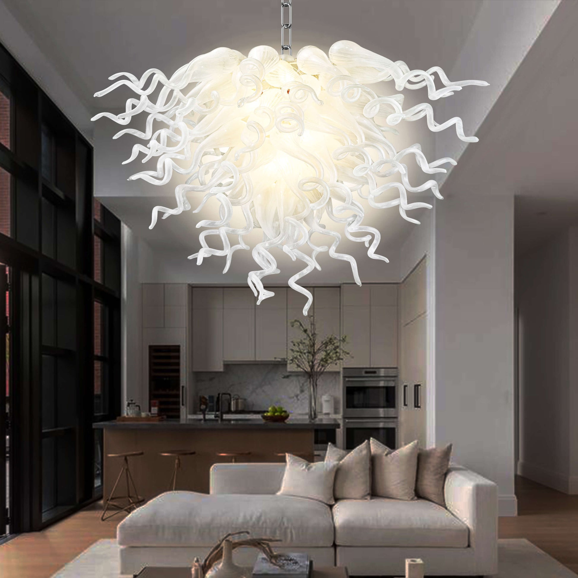 Chihuly-style pearl white hand blown glass chandelier creating a bright focal point in a modern living room design.