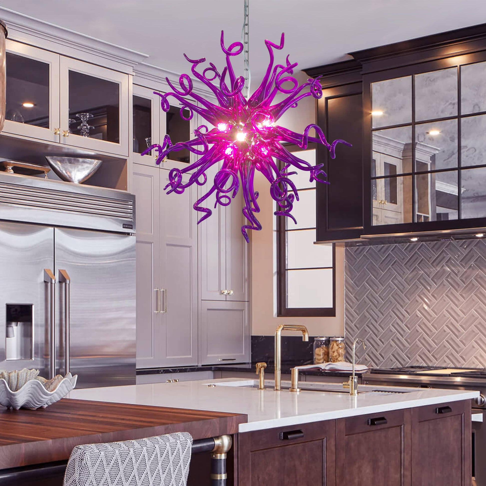 Elegant kitchen featuring a stunning purple hand blown glass chandelier.