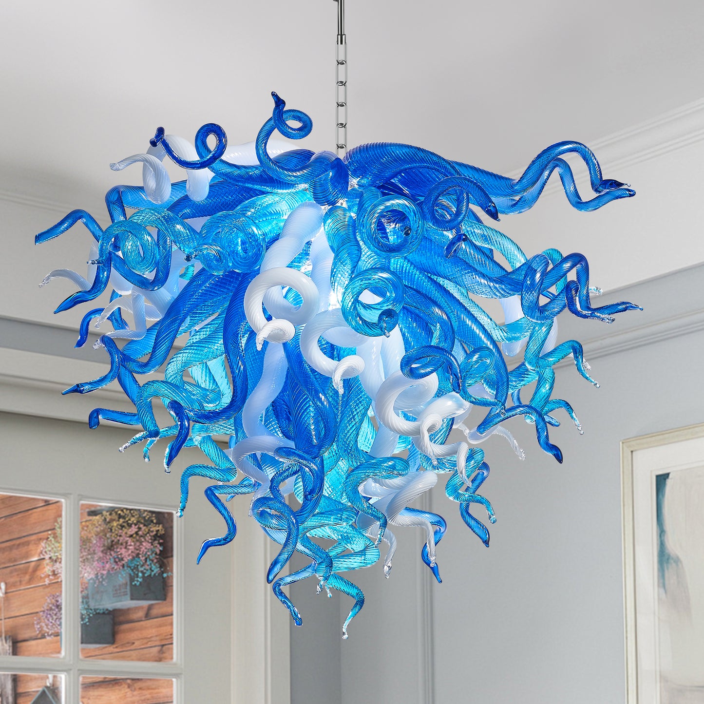 The dynamic sculptural form of the 28-inch artistic murano blown glass chandelier.