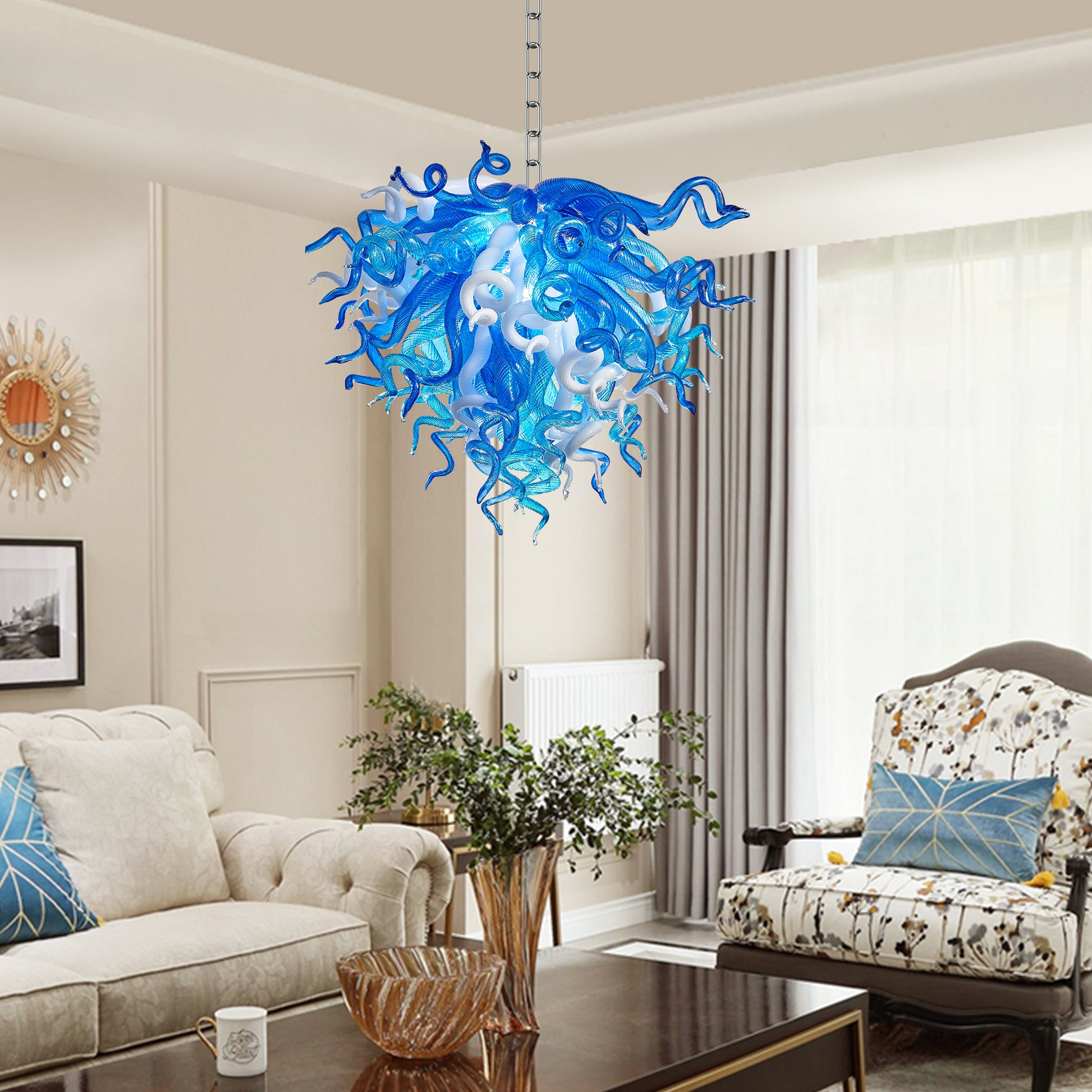 Chihuly-style blue murano blown glass chandelier in bohemian living room.