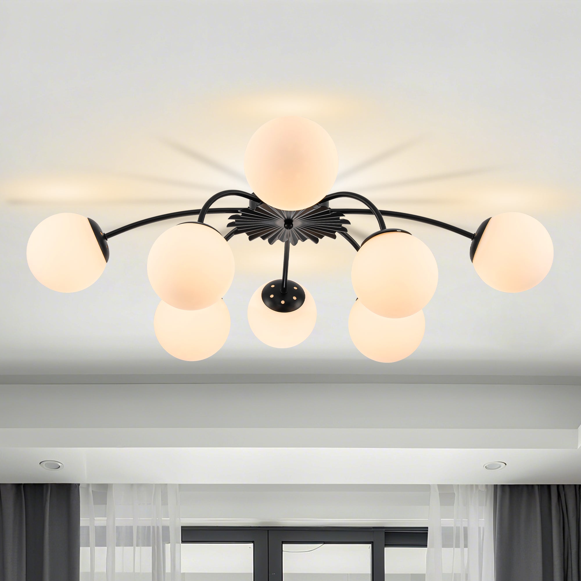 Contemporary black 8-light globe semi-flush mount ceiling light in airy living room. Hauptbild
