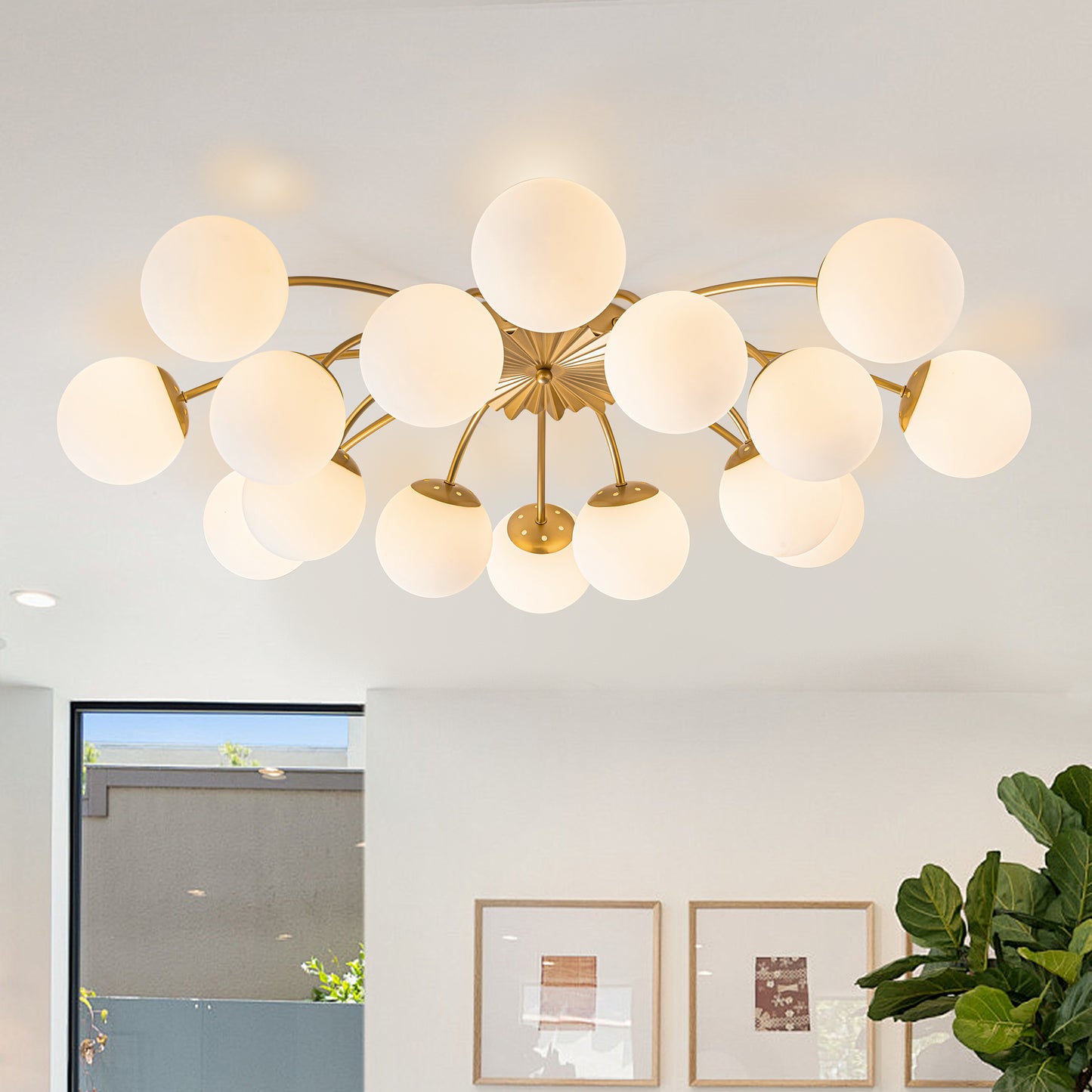 Detail shot of the 16-light gold semi-flush mount ceiling light featuring frosted glass globes.