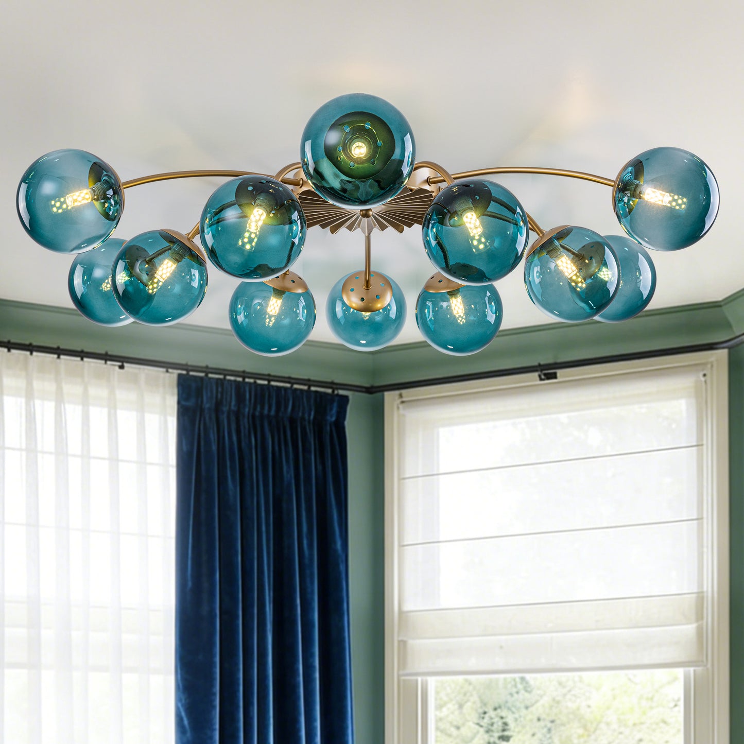 Elegant 12-light teal glass bubble globe ceiling light for contemporary interior decor.