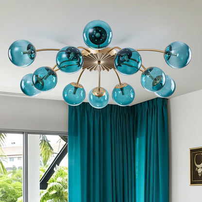 Industrial chic 12-light semi-flush mount ceiling light with teal tinted glass globe shades.