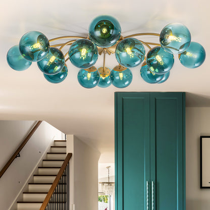 16-Light teal glass bubble globe ceiling light above staircase with teal cabinet accent.