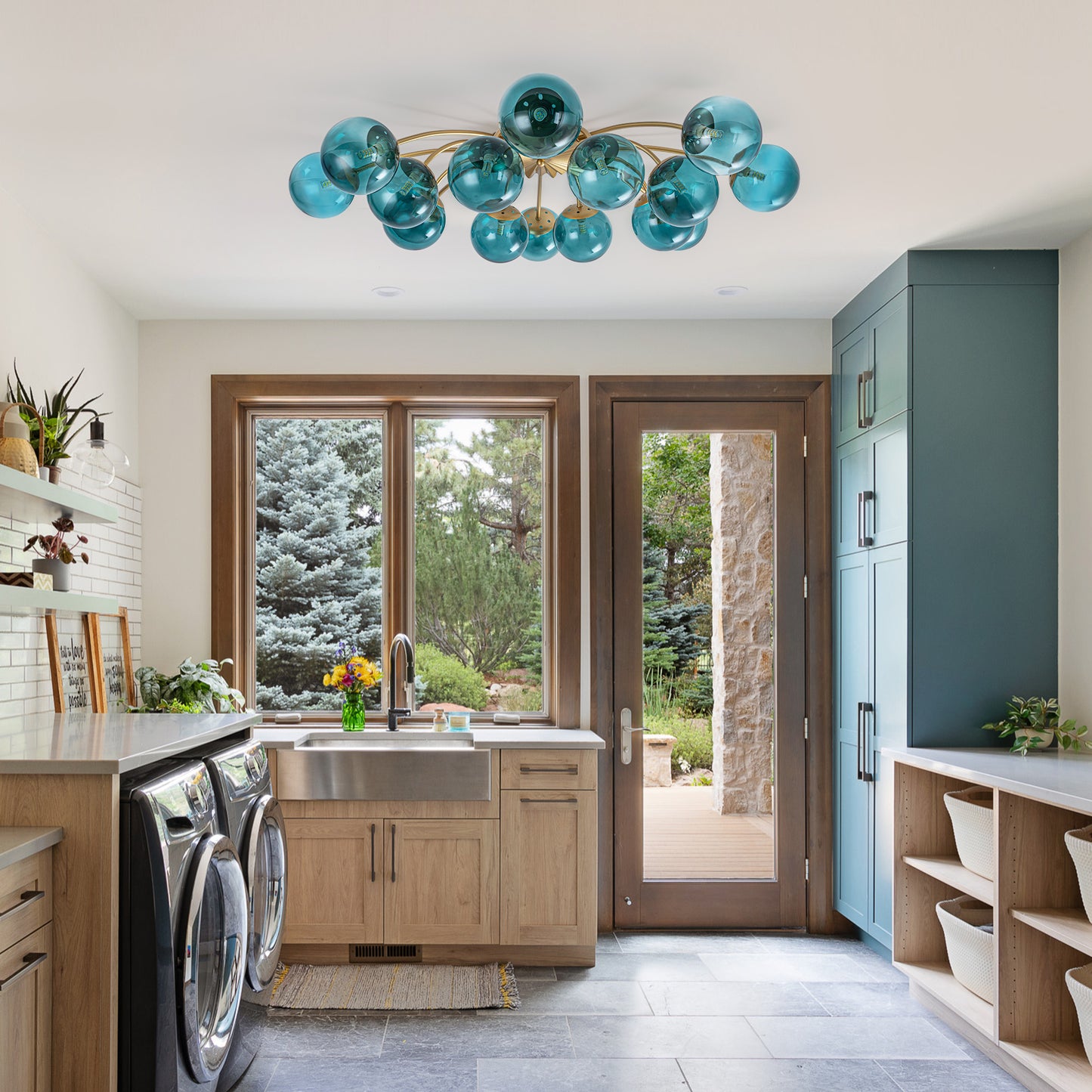 16-Light teal glass bubble globe ceiling light in mountain-style living room with wooden accents.