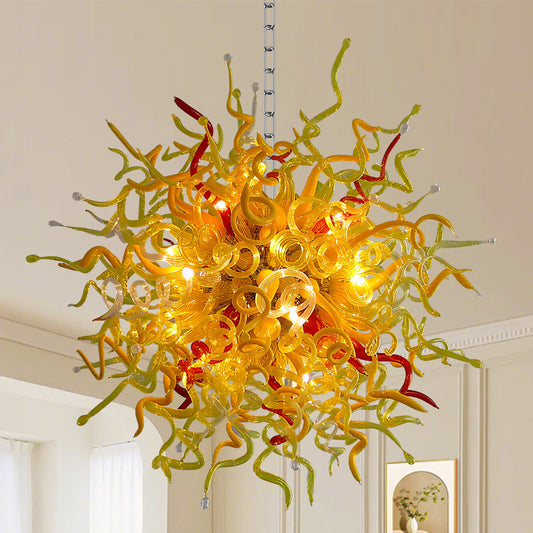 Oversized Chihuly style blown murano glass chandelier in golden, yellow and red.