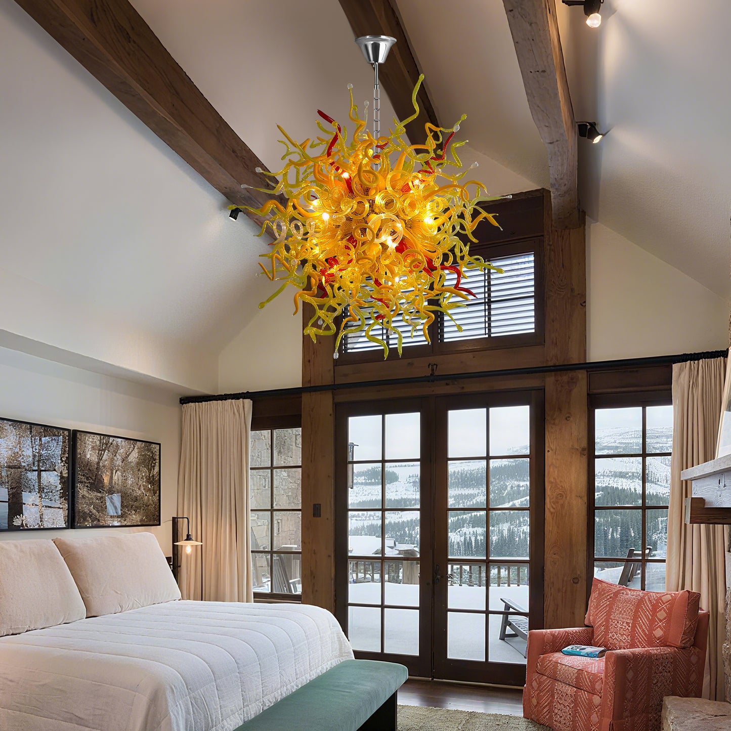 Chihuly-style blown murano glass chandelier in a rustic bedroom with vaulted ceilings.