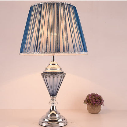 Elegant table lamp with blue pleated silk shade for bedroom