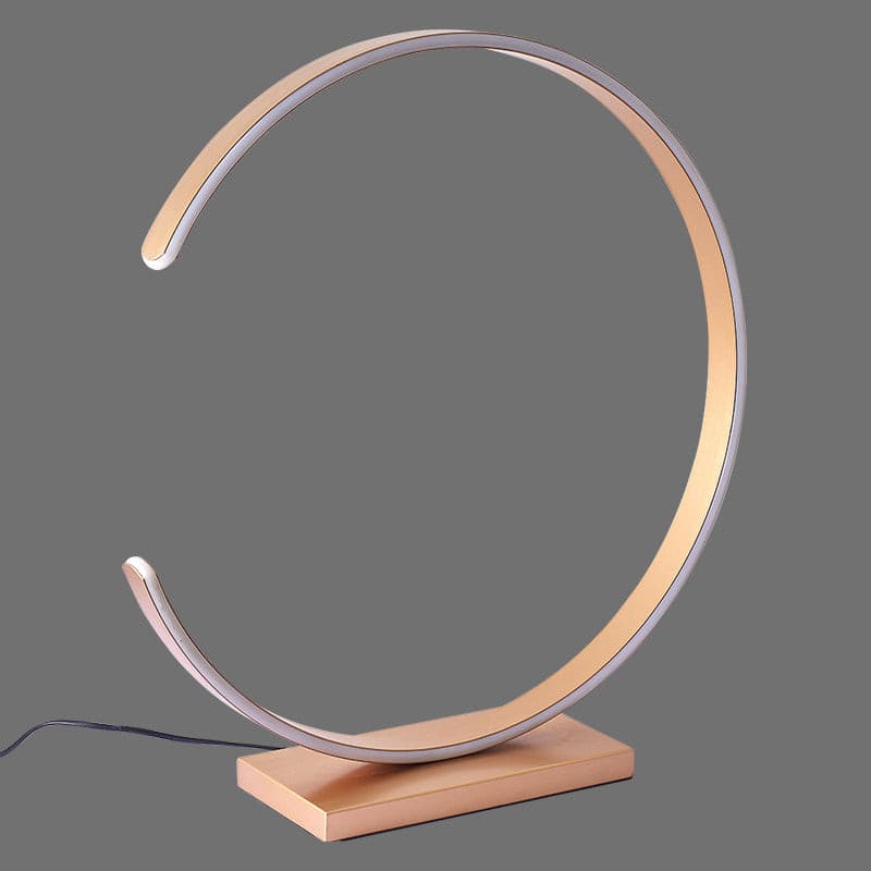 curved gold table lamps.jpg
