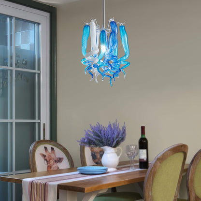 Blue and white blown glass pendant enhancing a romantic dining room ambiance.