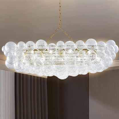 Rectangular cluster pendant light featuring individually hand-blown clear glass spheres with a distinctive spiral texture.