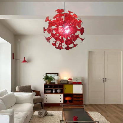 Contemporary living room interior featuring a vibrant red art glass ceiling fixture as a bold statement piece against neutral walls.
