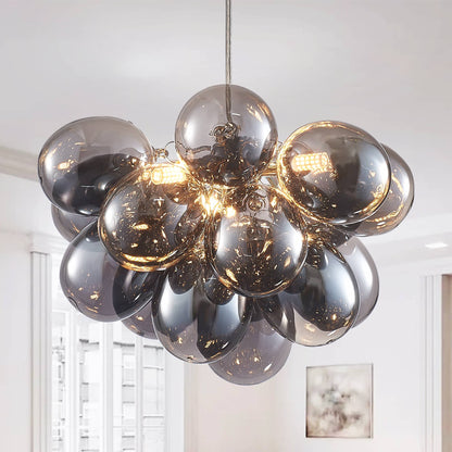Front and side views of the Obsidian Gloom blown glass chandelier, highlighting the symmetrical sphere shape and metallic electroplating craftsmanship.