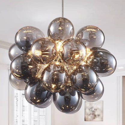 Front and side views of the Obsidian Gloom blown glass chandelier, highlighting the symmetrical sphere shape and metallic electroplating craftsmanship.