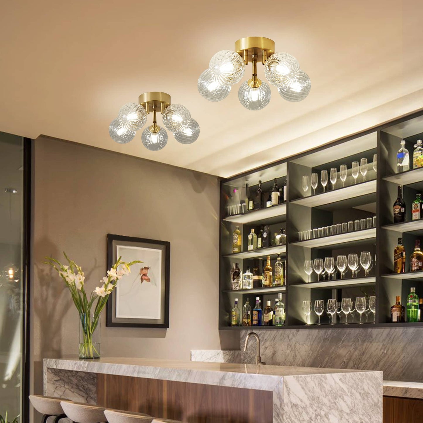Luxury home bar and kitchen area illuminated by a stylish brass semi-flush mount light with textured glass bubbles.