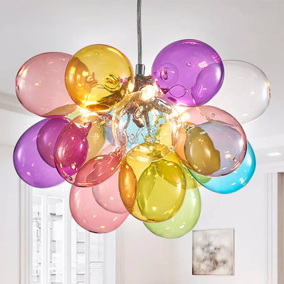 Artistic rainbow bubbled glass ball chandelier displayed against a clean, modern white wall background.