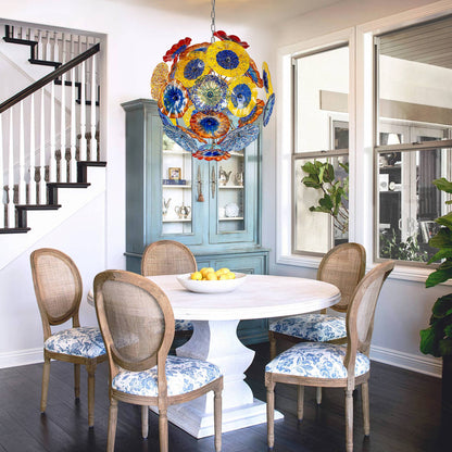 Modern art glass chandelier creating an intimate atmosphere in a luxury restaurant dining booth.