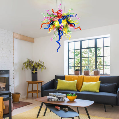 Modern small-sized multicolor glass chandelier adding a pop of color to a minimalist living room with a grey sofa.