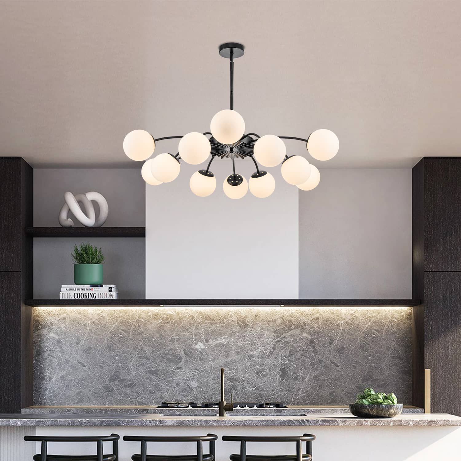 Modern kitchen with a Elegant globe pendant chandelier above the countertop.
