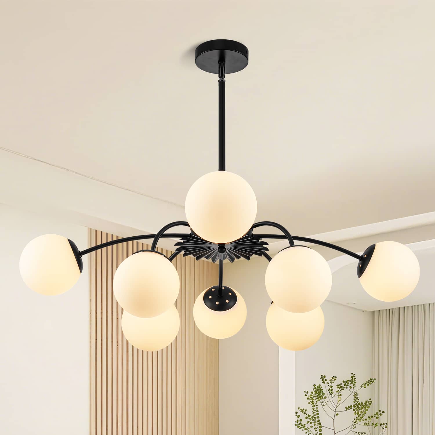 Brushed black modern chandelier with bubble-style frosted globes