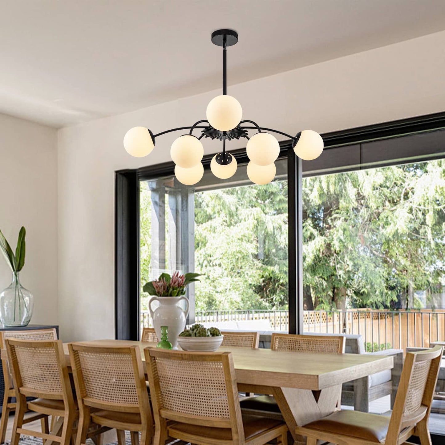 Bubble-style frosted glass chandelier in a contemporary dining room