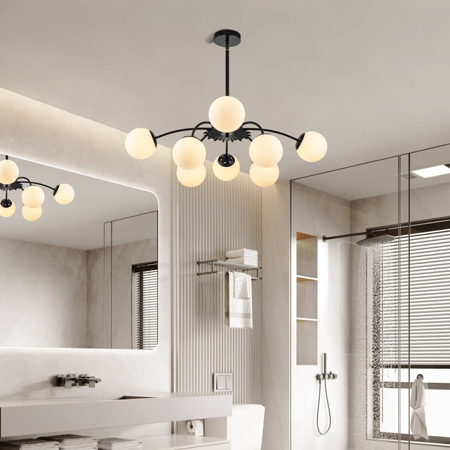 Modern chandelier in a bathroom with mirrors and shower area.