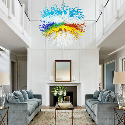 Elegant white living room featuring a large multi-colored art glass chandelier.