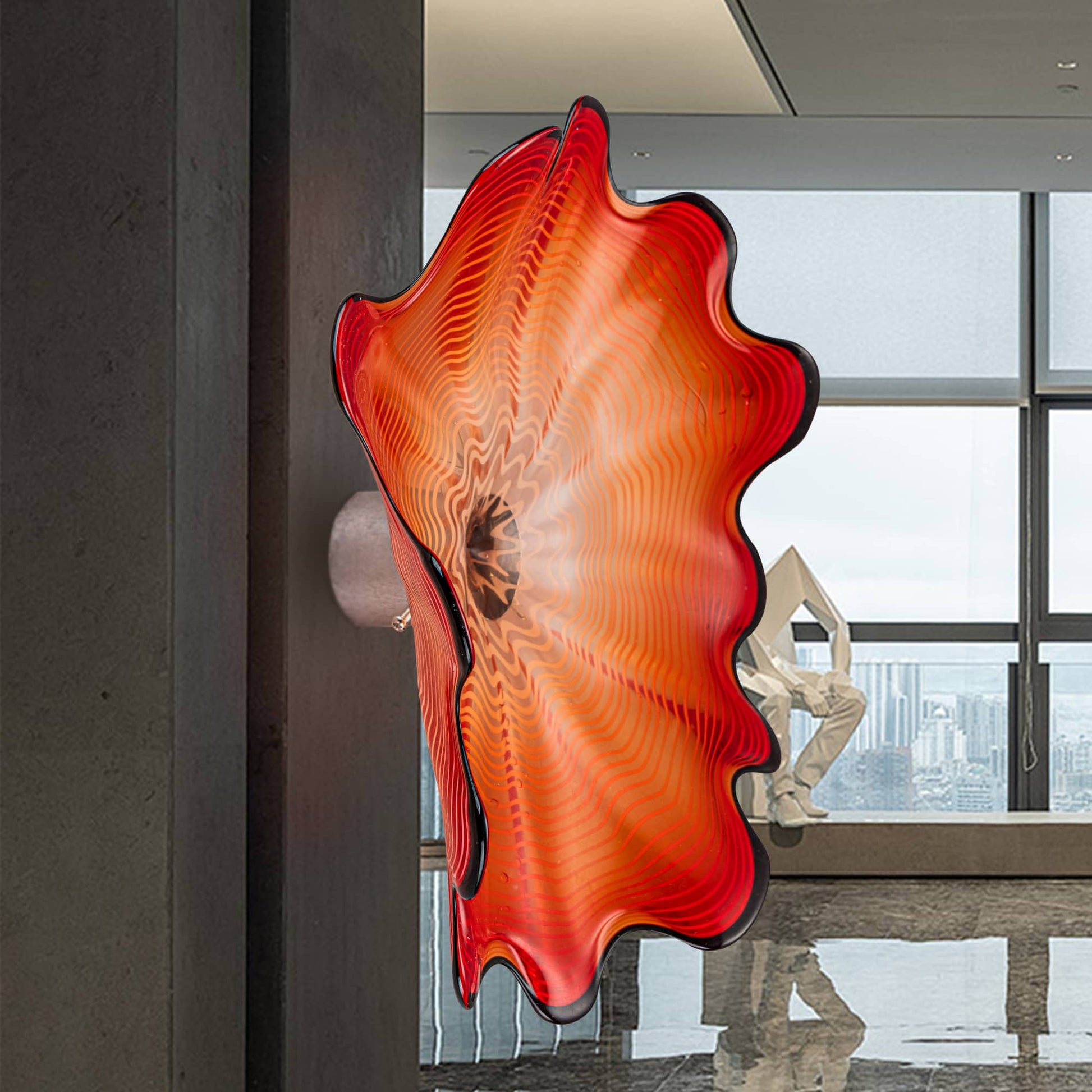 Side view of a vibrant red Murano style glass wall decor showing the metal mounting bracket.