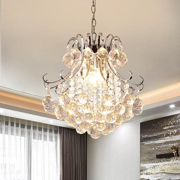Modern luxury chandelier featuring tiered crystal ball pendants and stainless steel frame.