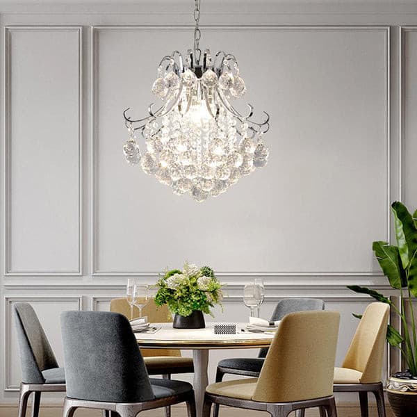Polished stainless steel hardware and chain of a luxury modern pendant lamp.