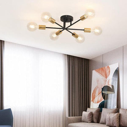 Mid-century modern 6-arm spoked chandelier in a bright, airy living room with a large window and neutral decor.