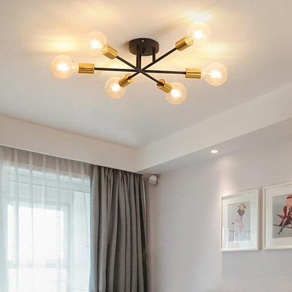Minimalist 6-light semi flush mount chandelier in brushed brass, perfect for low ceiling living room lighting.
