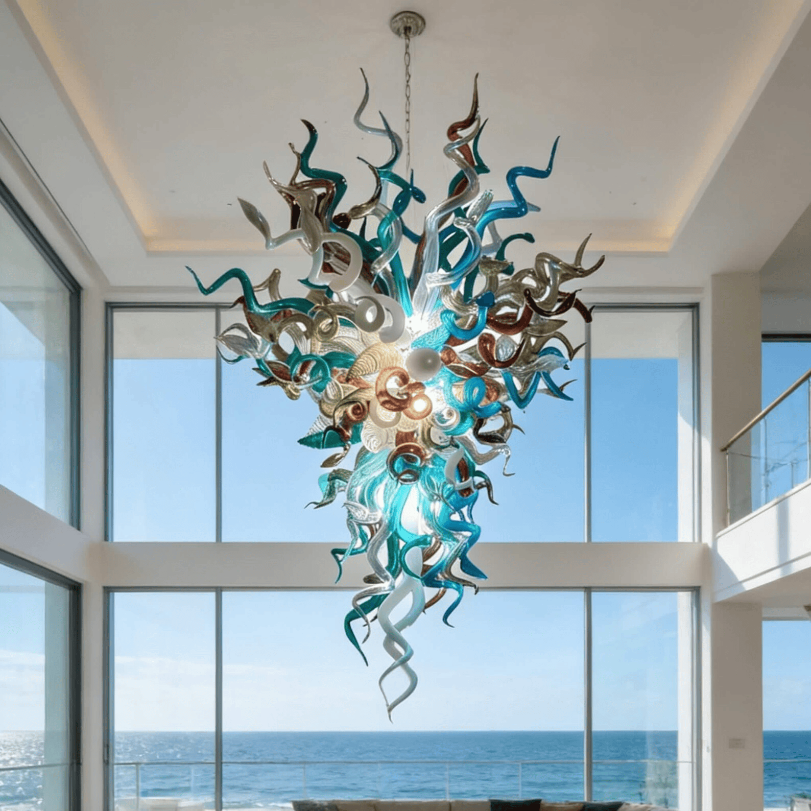 Blue and teal handblown glass chandelier with twisting sculptural arms and artistic modern ceiling light design