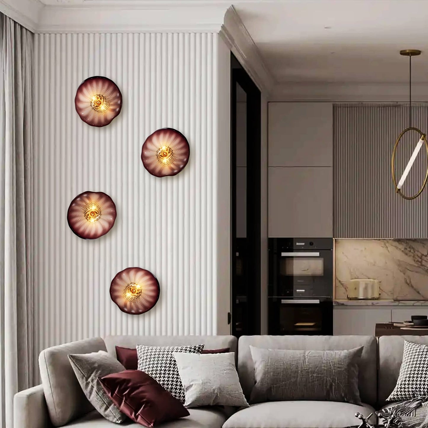 Four Murano glass wall sconces arranged vertically in a modern grey living room for a luxury aesthetic.