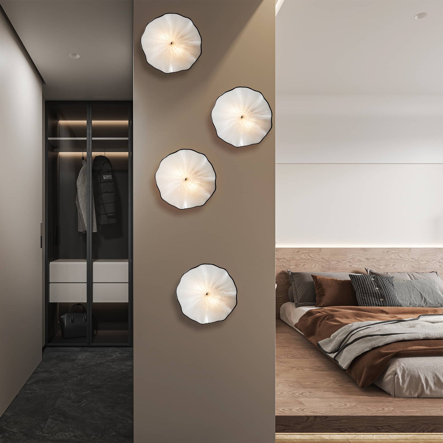 Three pearl white glass wall plates arranged vertically on a dark grey wall for a modern minimalist look.